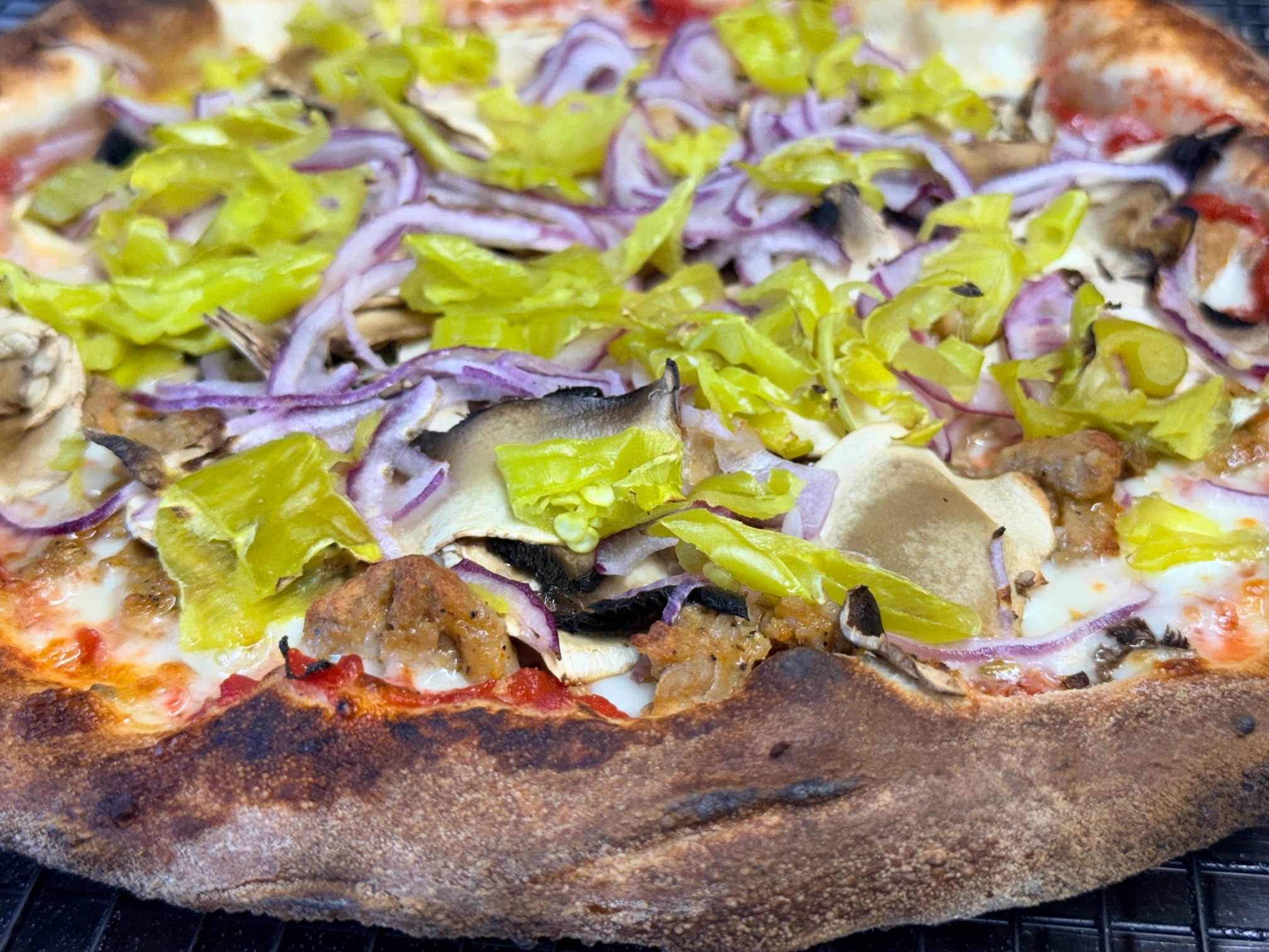 Hawaiian style pizza with jalapenos