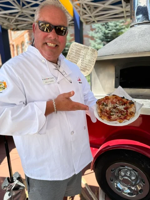 Holding special pizza